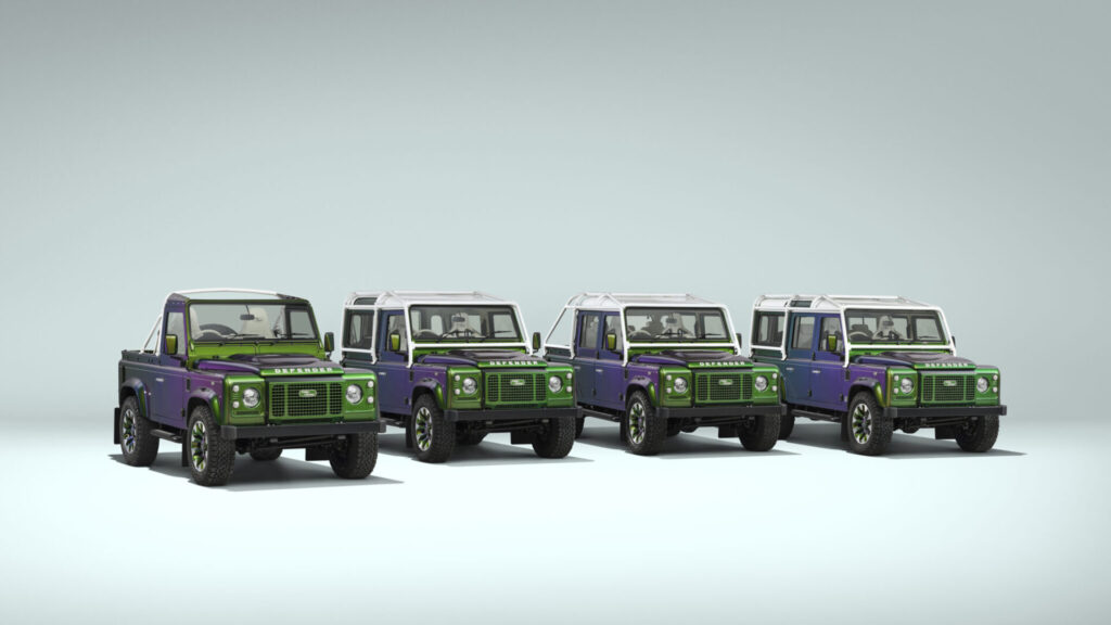 Five Land Rover Defender SUVs in purple and green lined up on a pale blue backdrop.